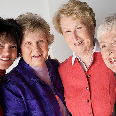 Three women standing together