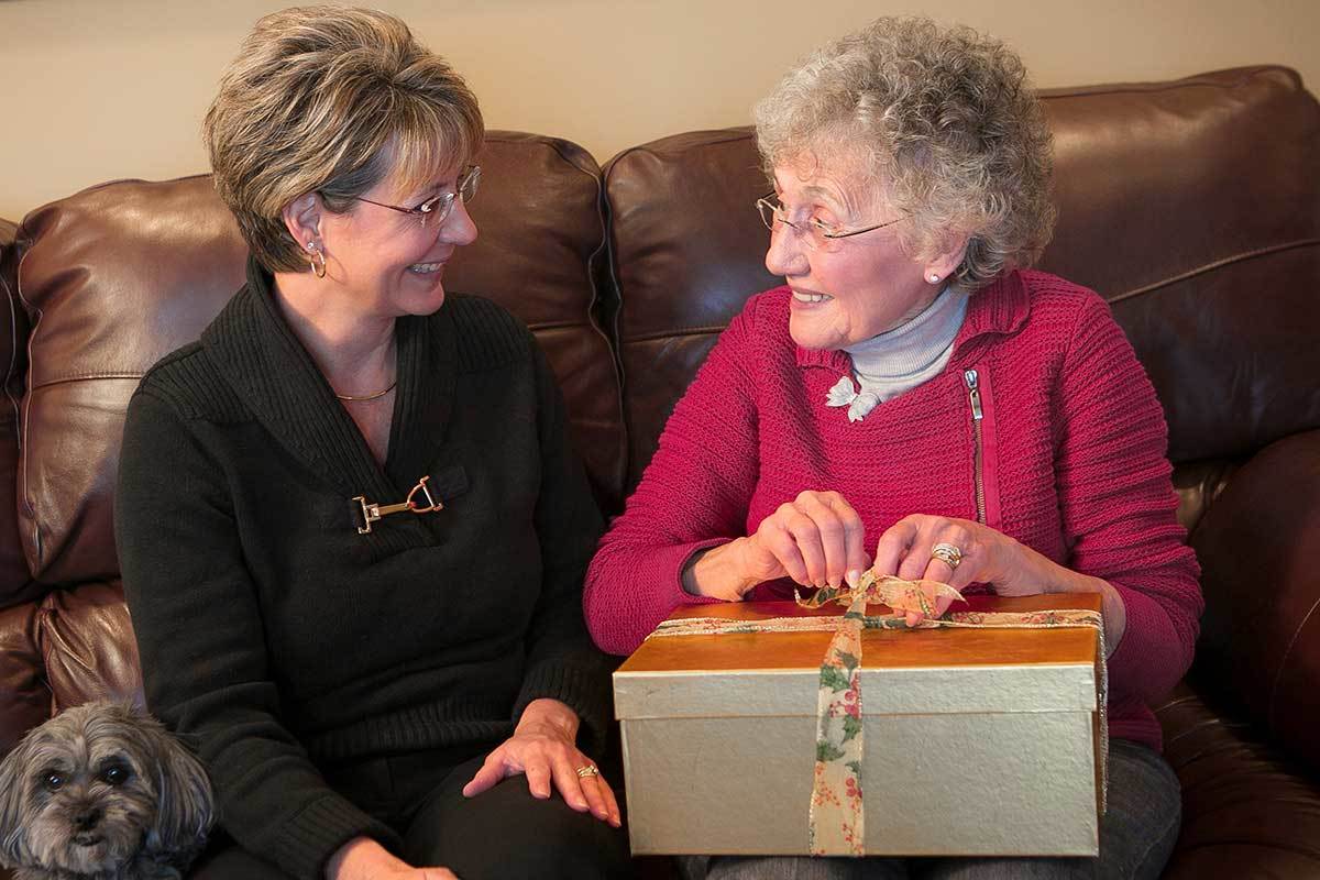 giving a gift to a senior.
