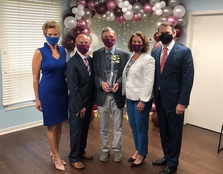 Celebrating the 2021 Home Instead North American CAREGiver of the Year in Charleston, S.C., are Lori Hogan, Co-Founder, Home Instead, Shannon Carithers, franchise owner, Home Instead of Charleston, Bill Glover, 2021 Home Instead North American CAREGiver of the Year, Melody Carithers, franchise owner, Home Instead of Chaleston and Paul Hogan, Co-Founder, Home Instead.